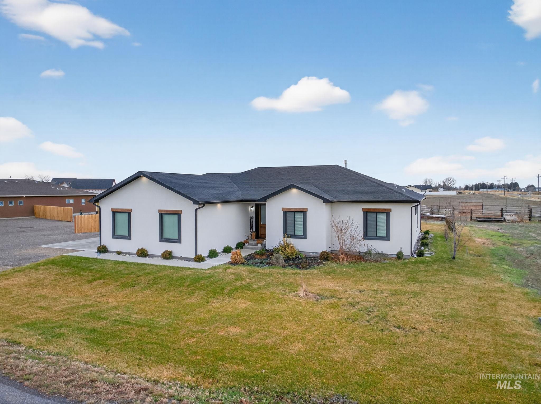 View of front of property featuring stucco siding