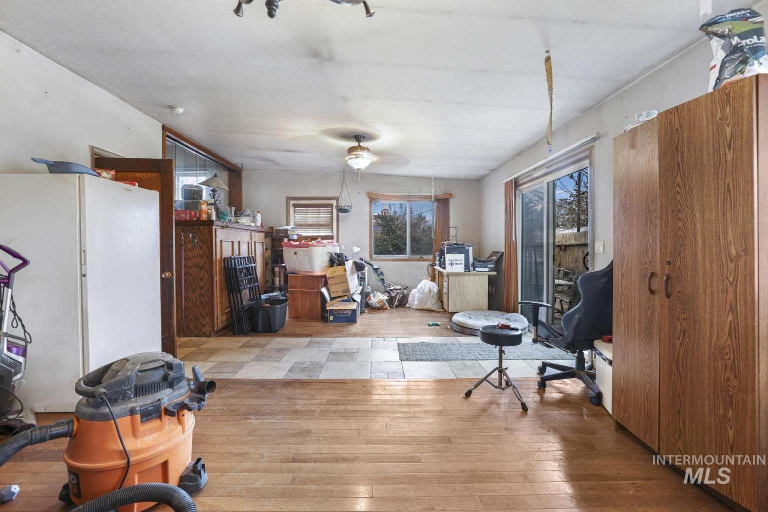 Miscellaneous room with hardwood / wood-style flooring