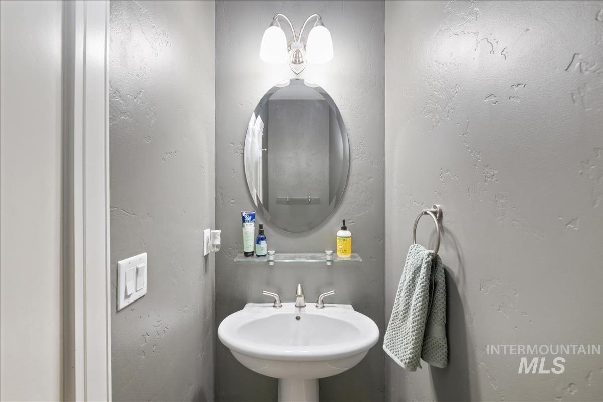 Bathroom featuring a textured wall