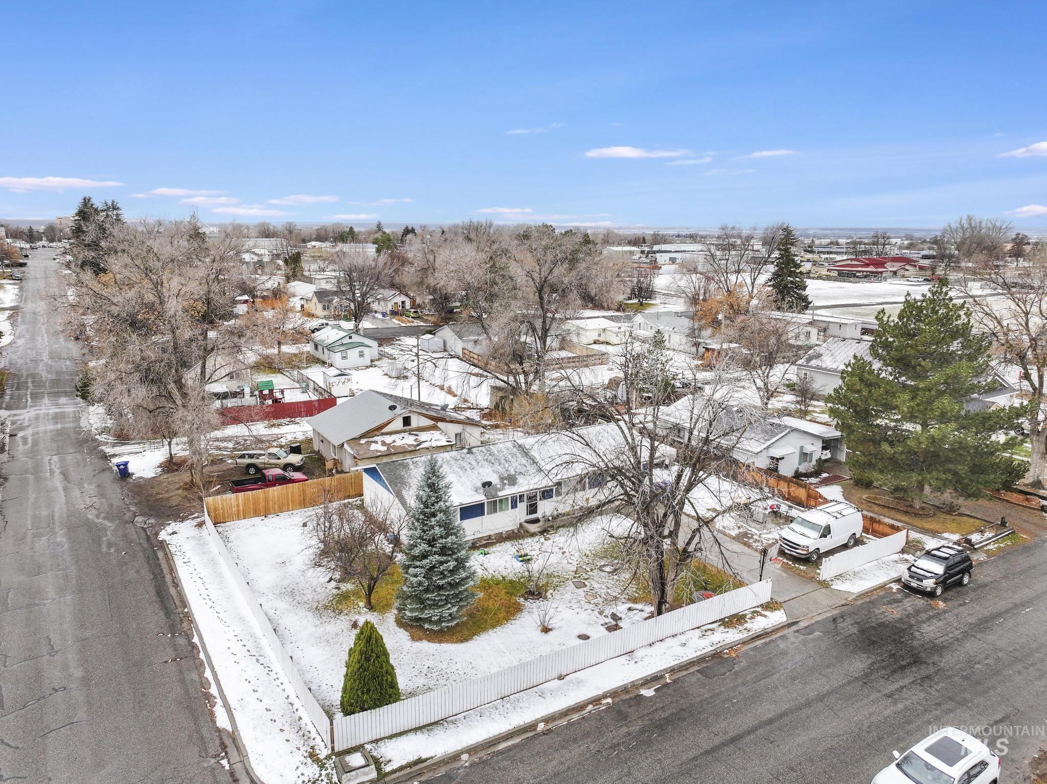 Snowy aerial view with a residential view