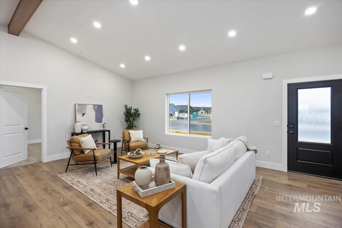 Living area featuring recessed lighting and light wood-type flooring