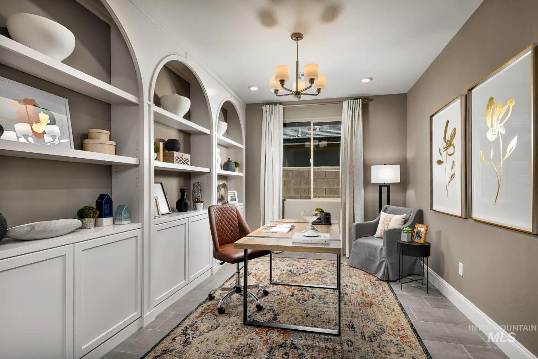 Home office with a chandelier and recessed lighting