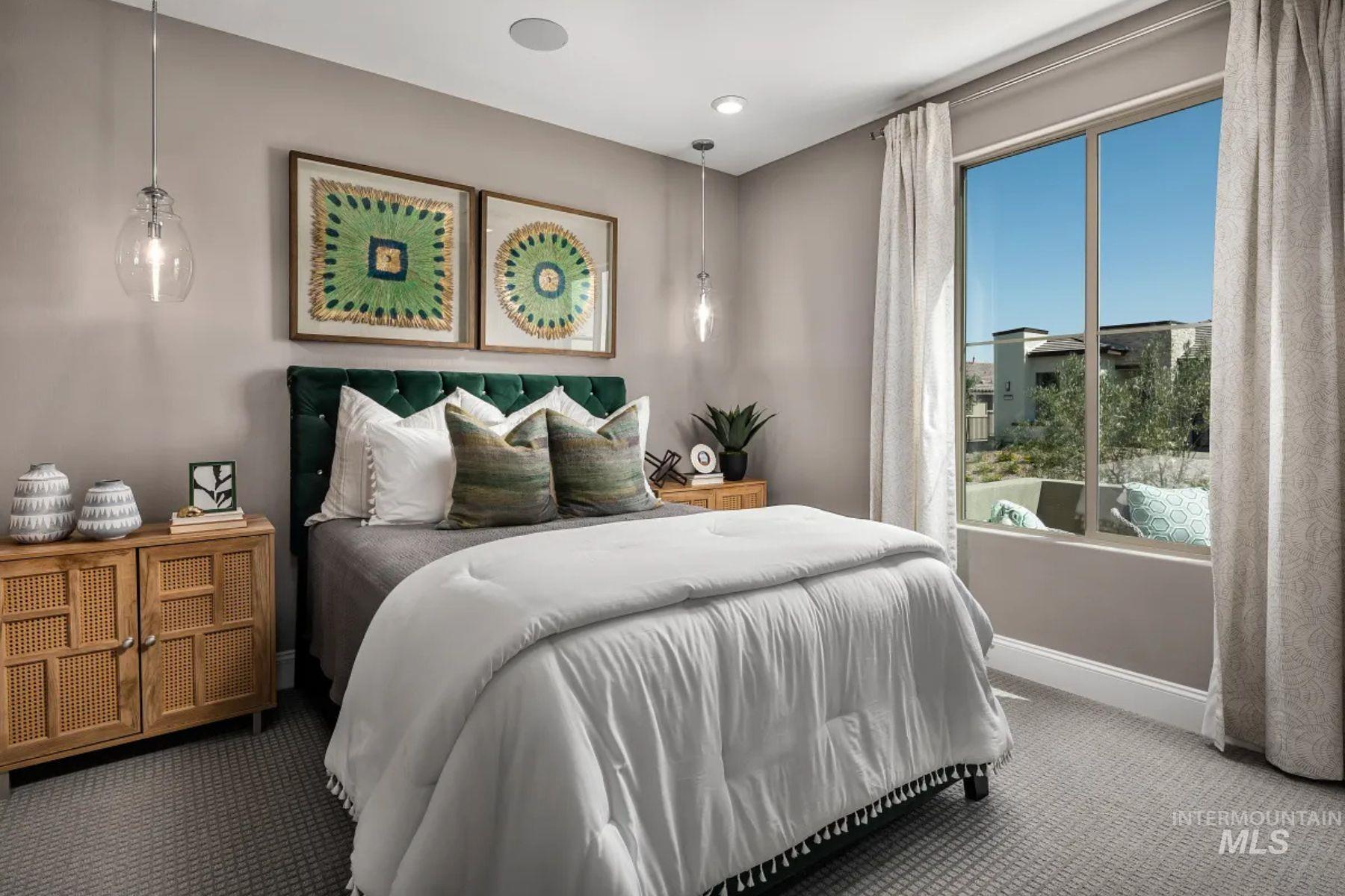 Carpeted bedroom featuring baseboards