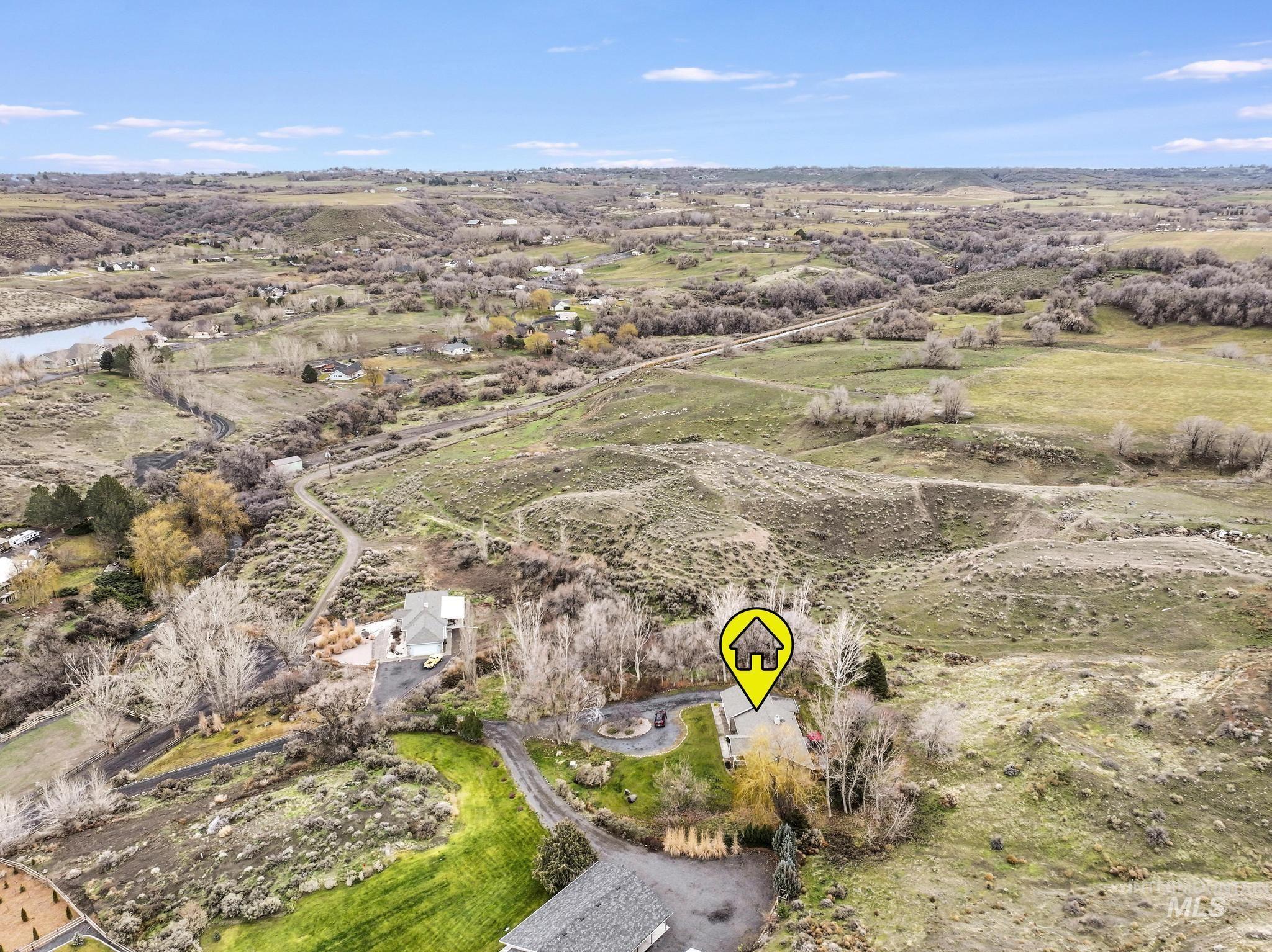 Aerial overview of property's location featuring rural landscape