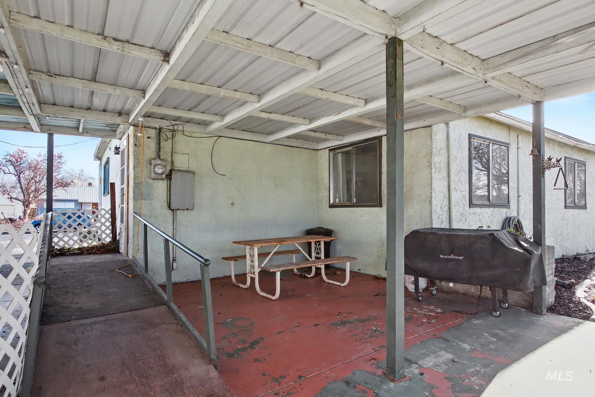 View of patio featuring area for grilling