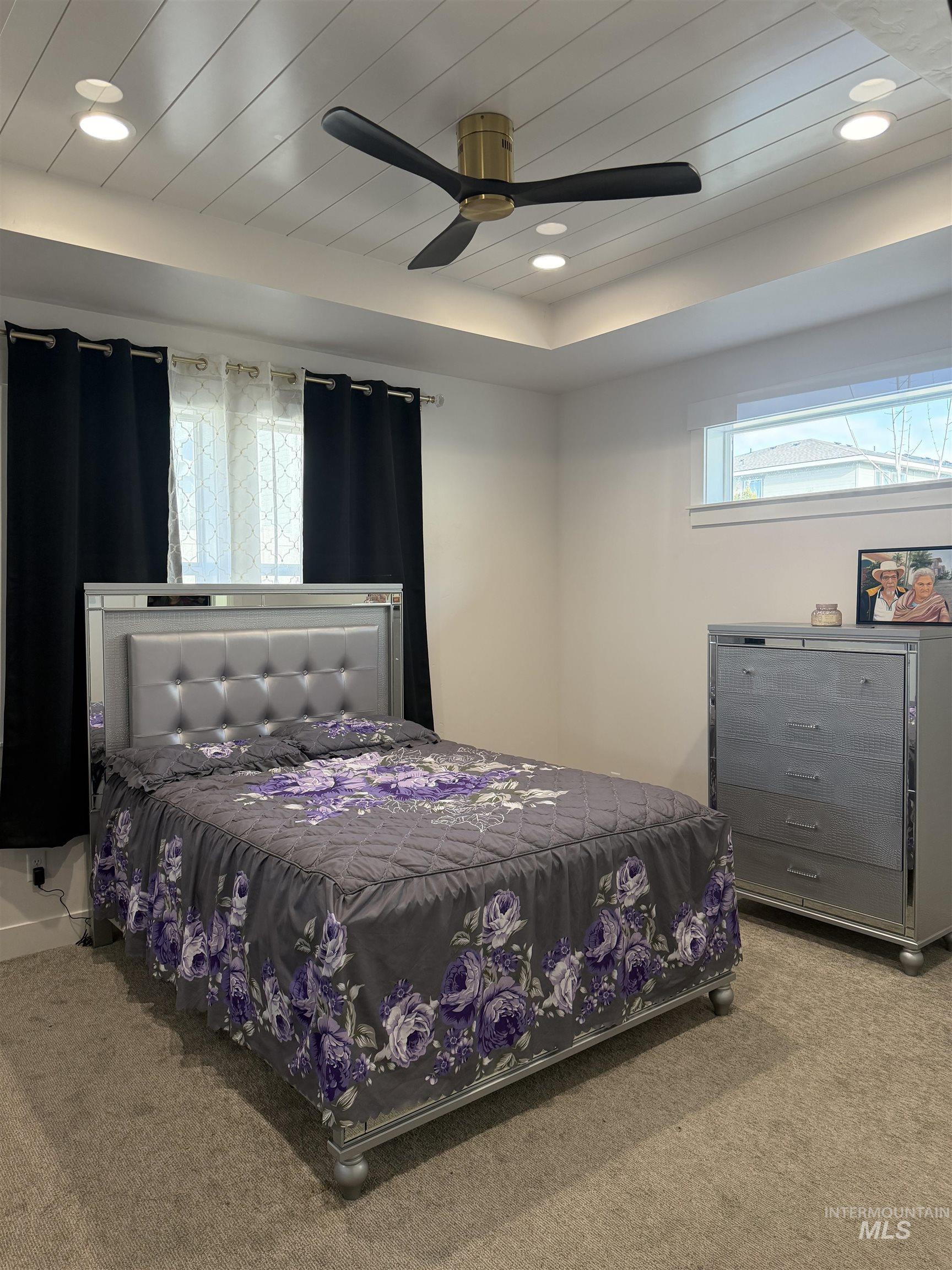 Bedroom featuring carpet floors, recessed lighting, a ceiling fan, and wooden ceiling