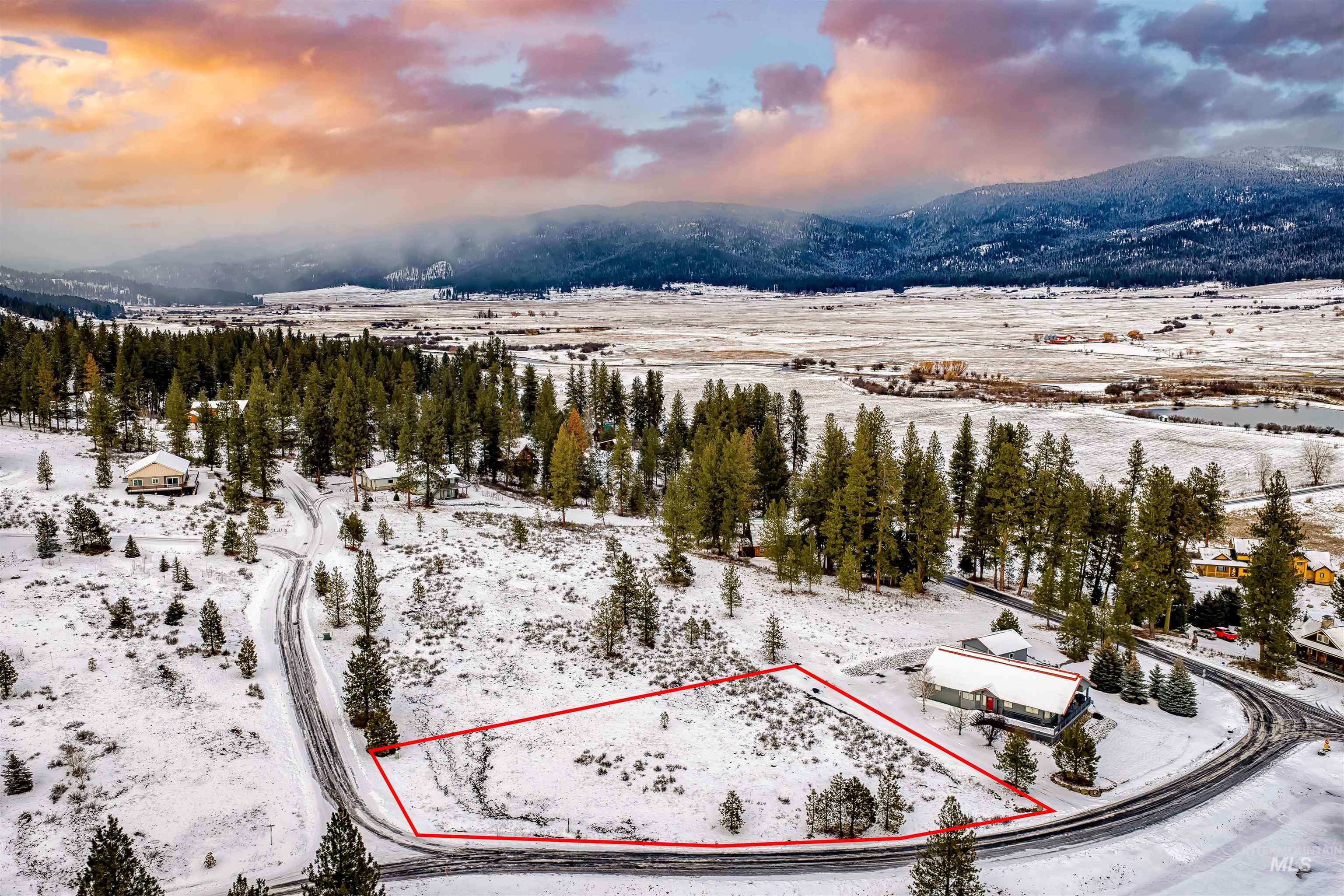 Aerial overview of property's location with property parcel outlined