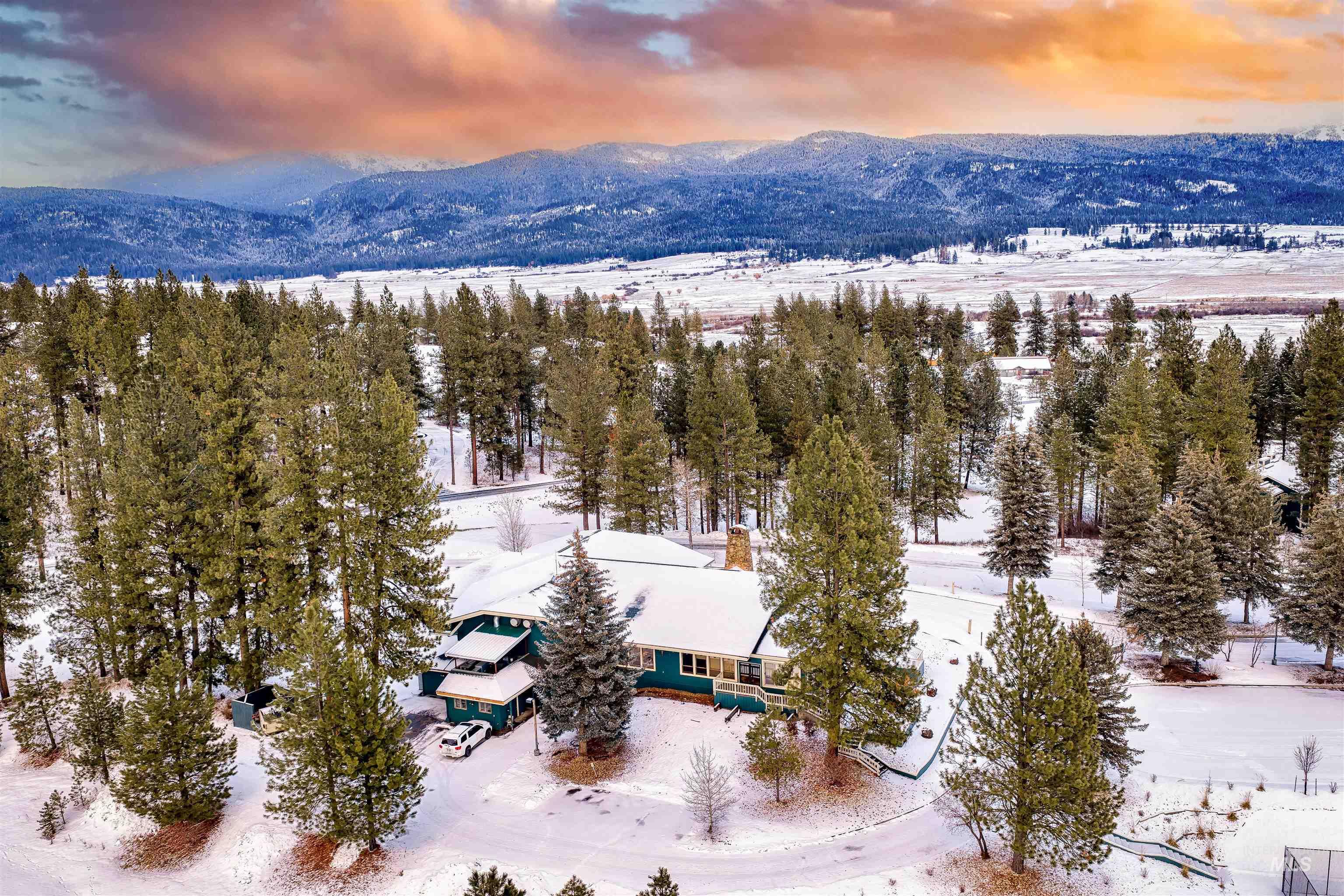 Snowy aerial view with a mountain view