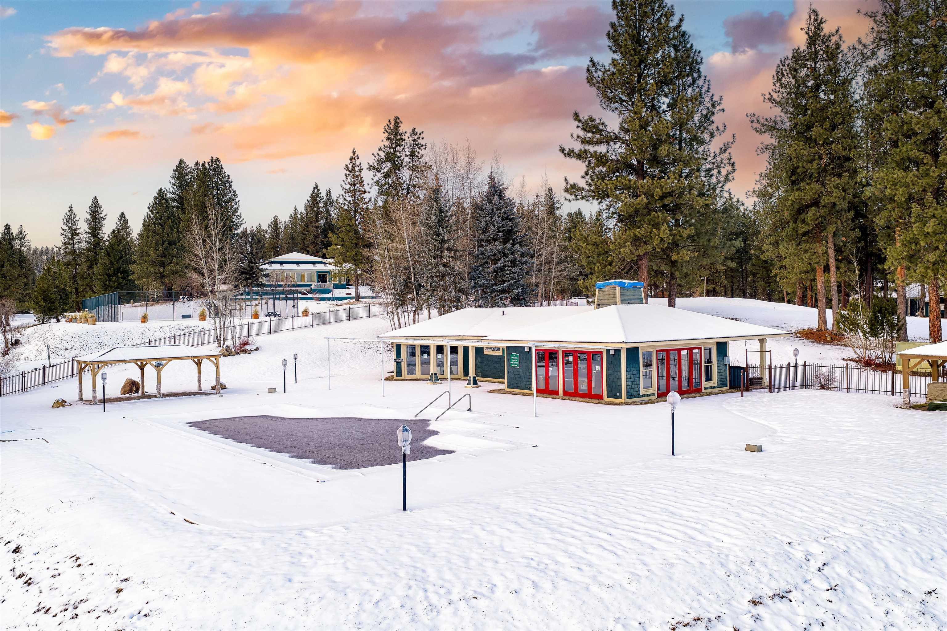 Snow covered house with a chimney