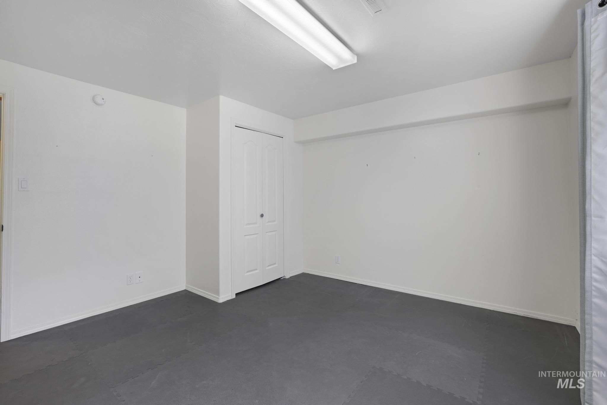 Empty room with baseboards