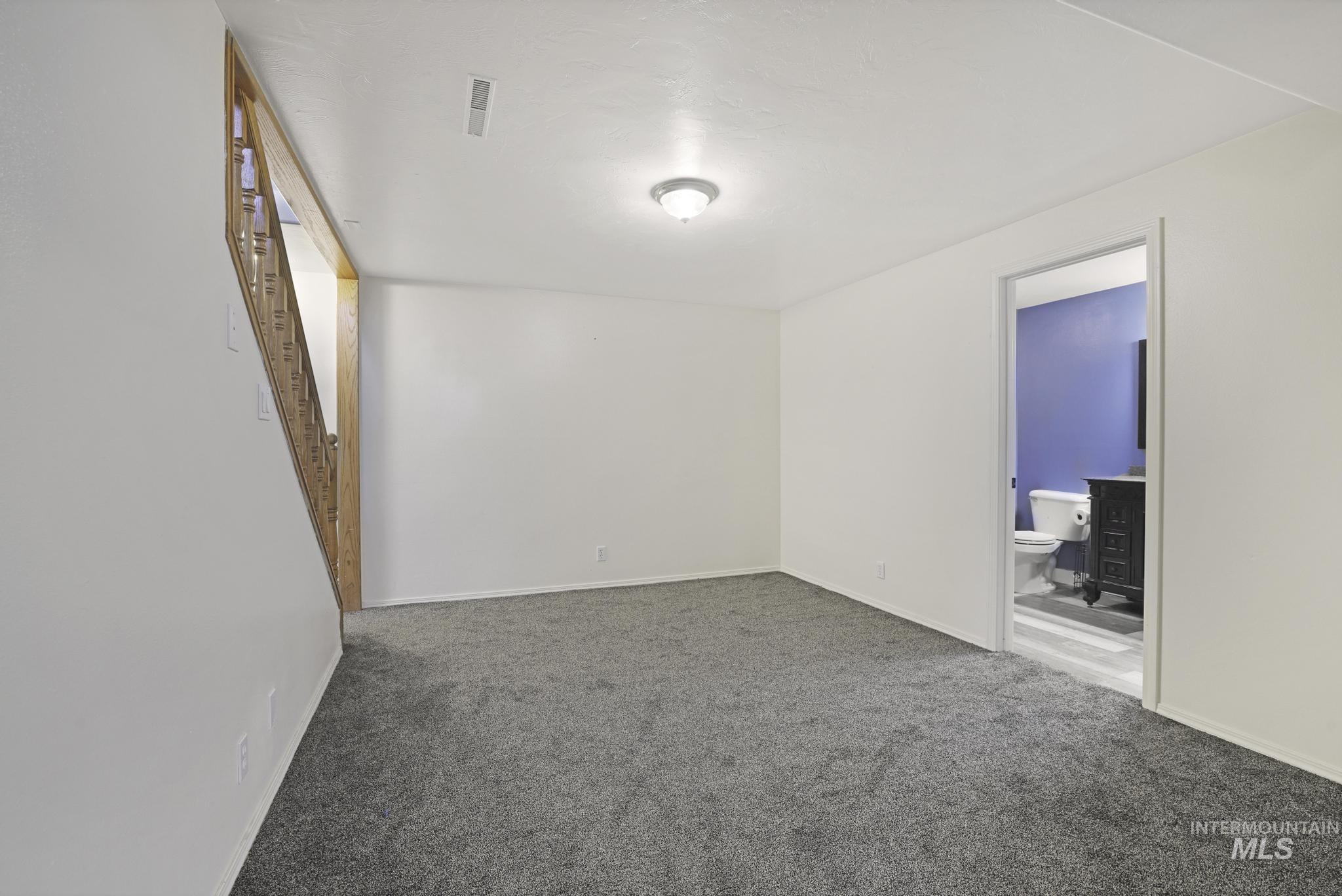 Unfurnished room featuring carpet floors