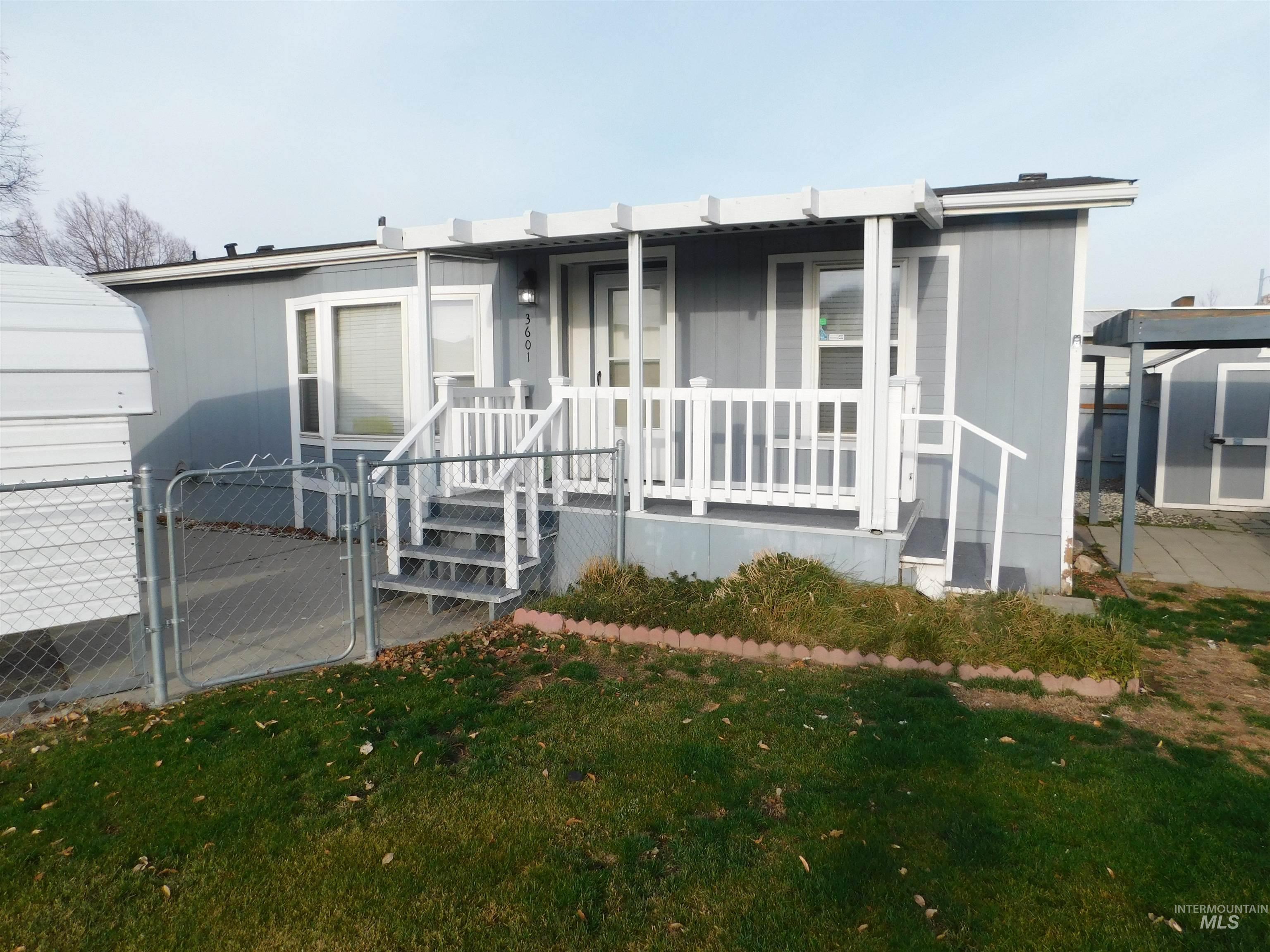 View of front facade with a gate