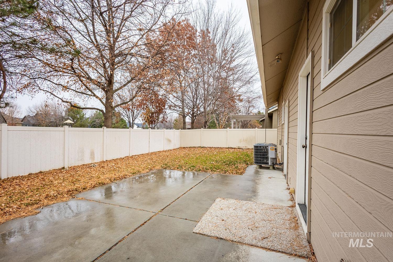 Fenced backyard featuring a patio area