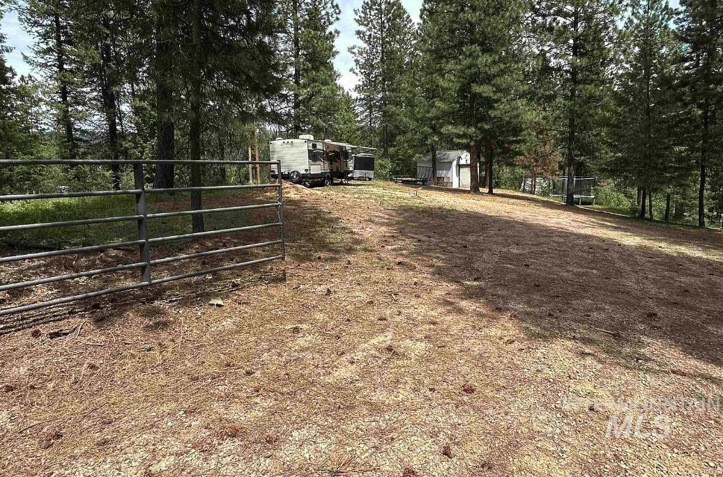 View of yard featuring a gate