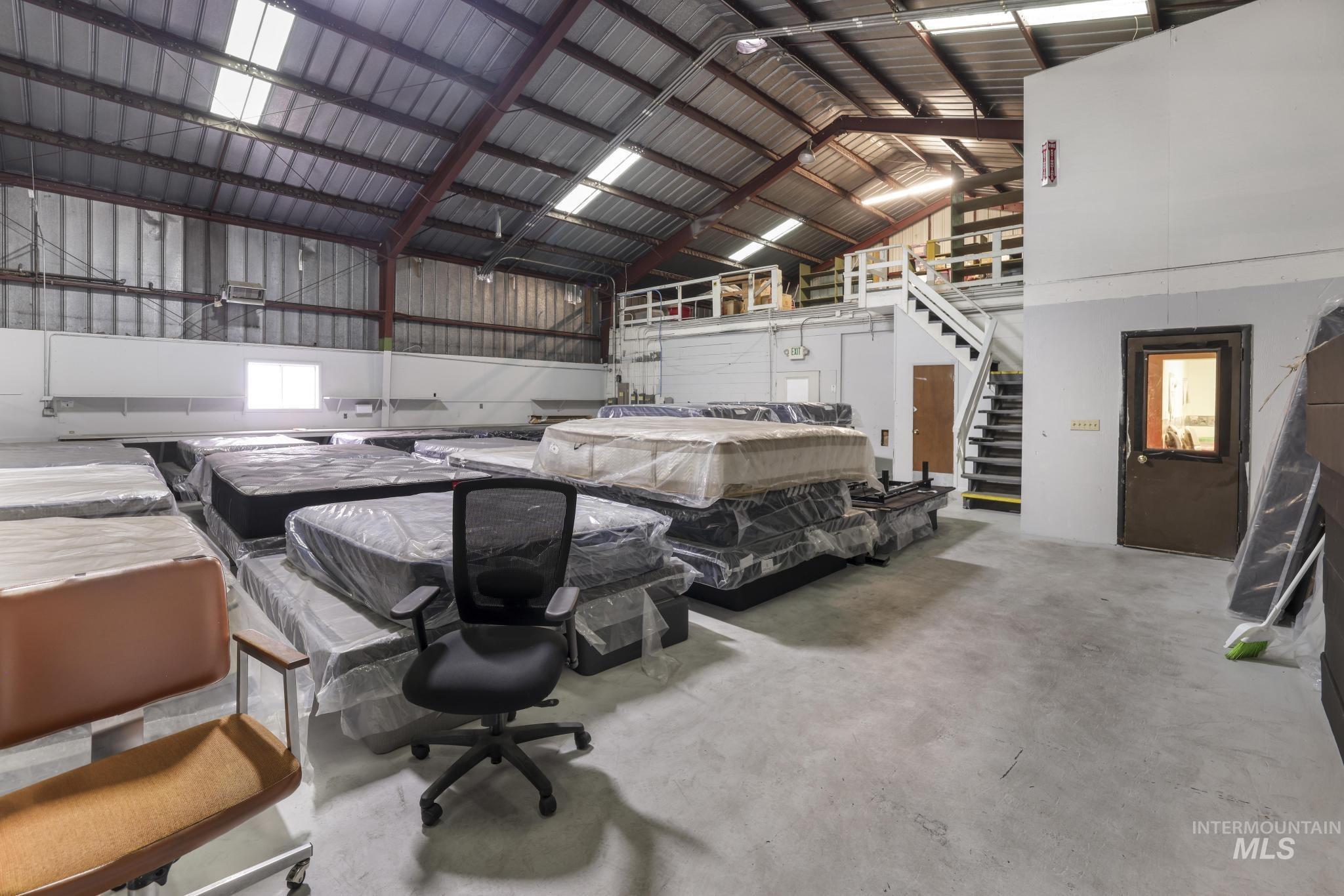 Garage featuring metal wall