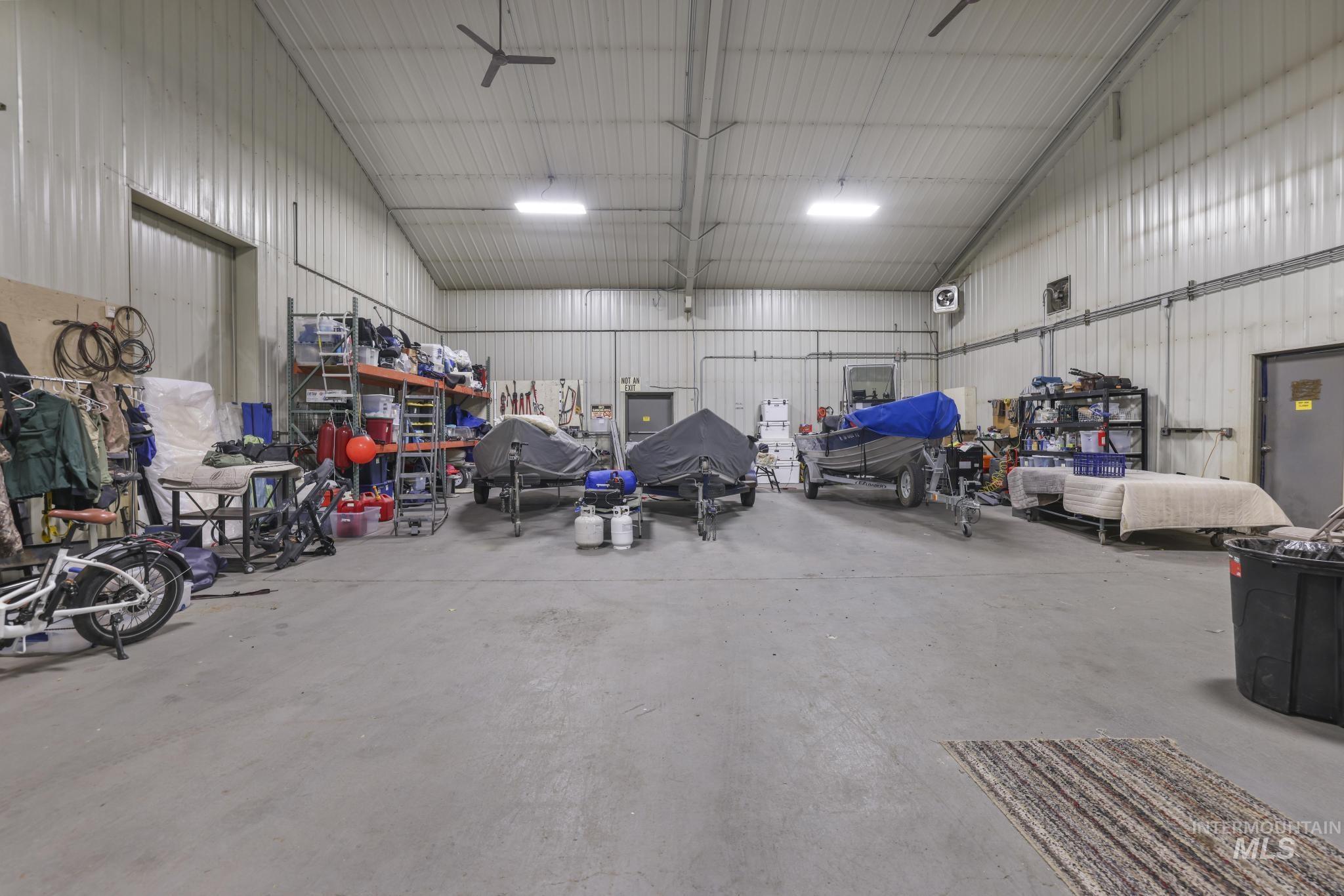 Garage featuring metal wall