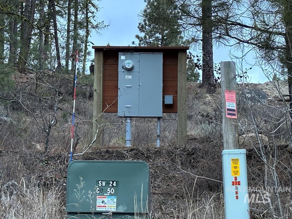 Exterior view of a pad mount transformer and electric meter