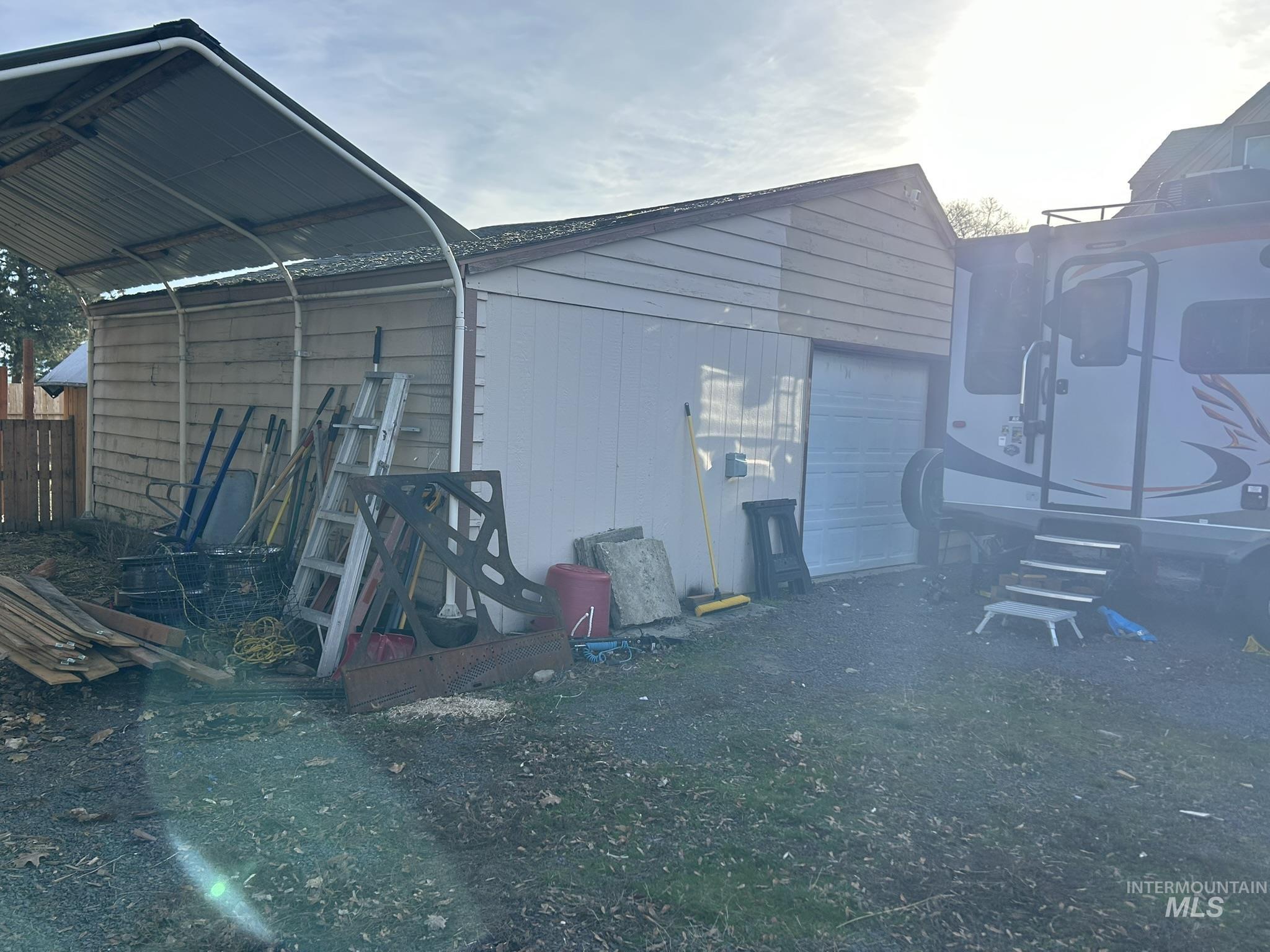View of outbuilding with a garage
