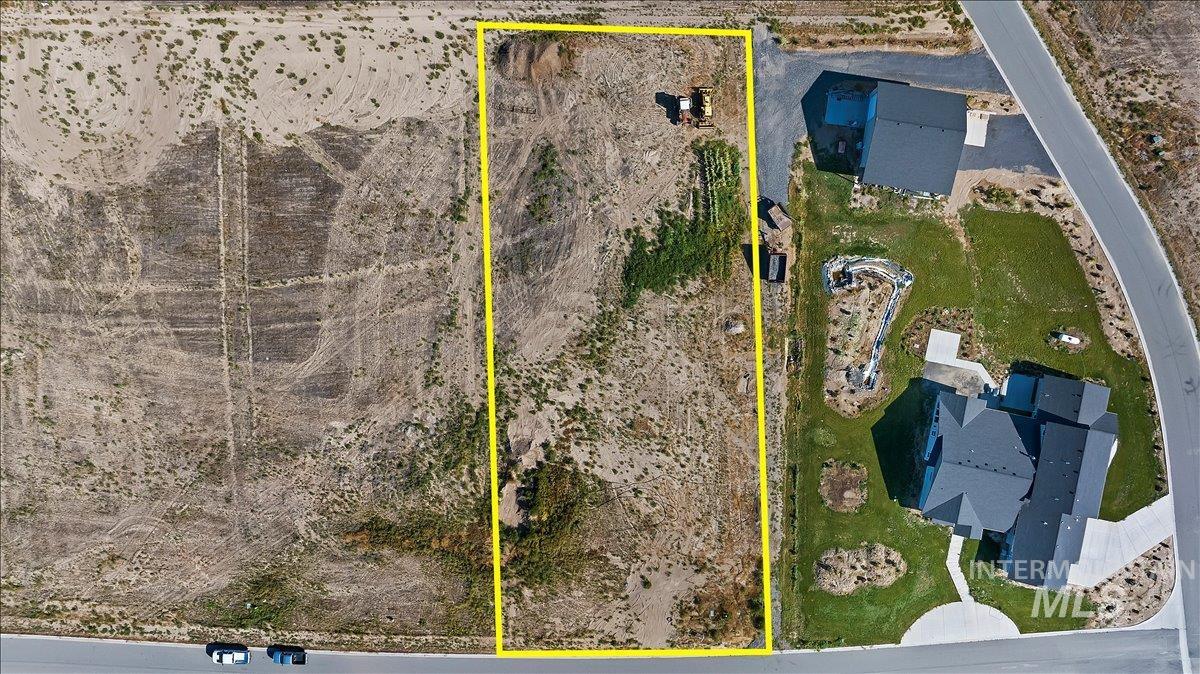 Aerial overview of property's location with property parcel outlined