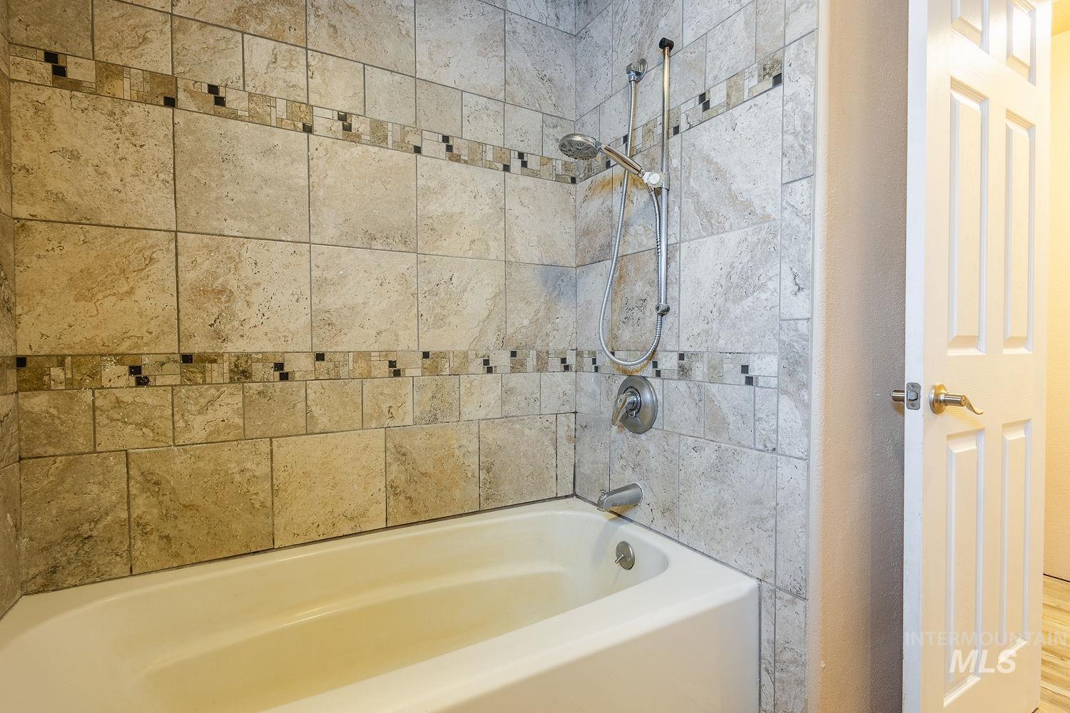 Full bathroom featuring shower / tub combination