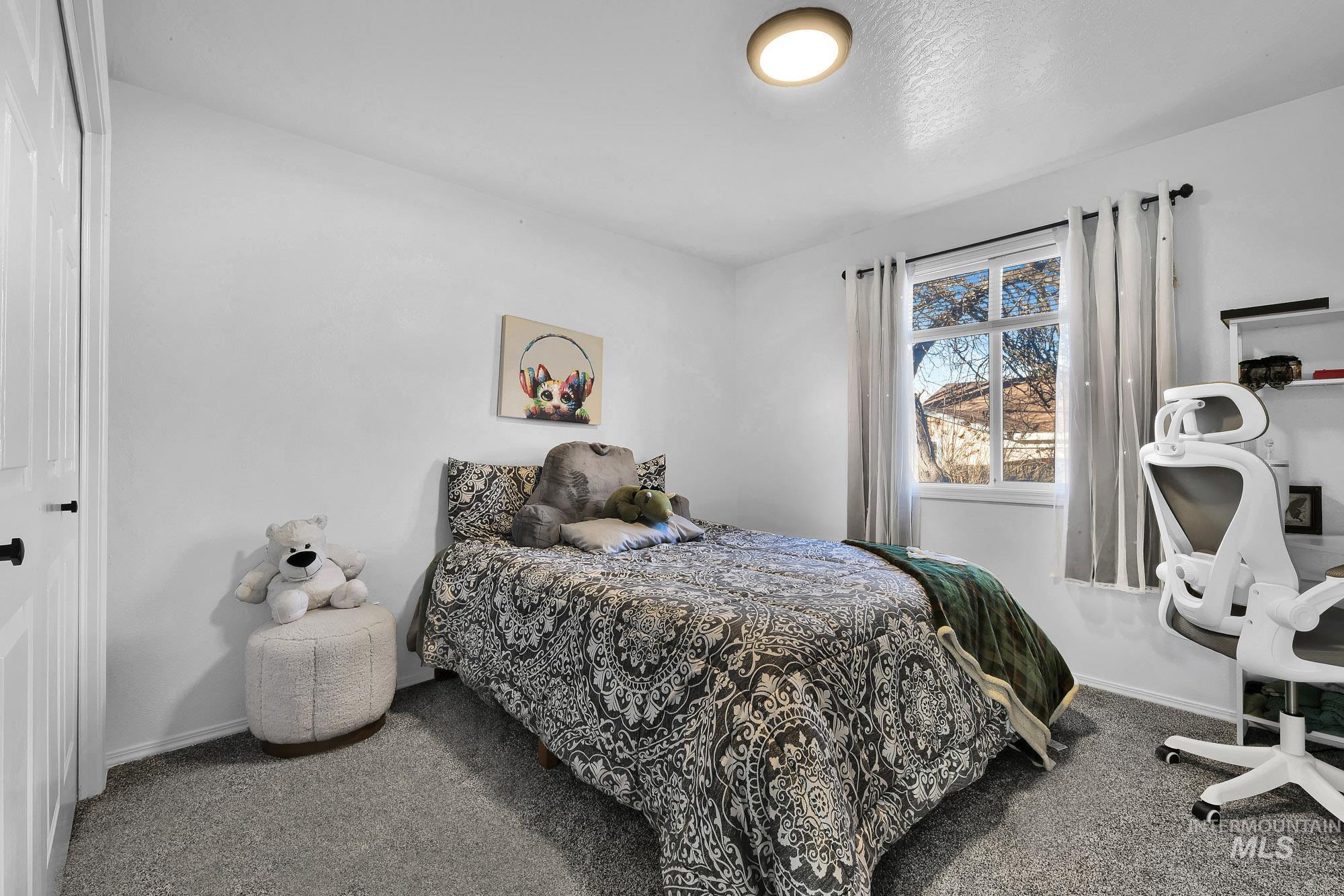 Bedroom with carpet flooring