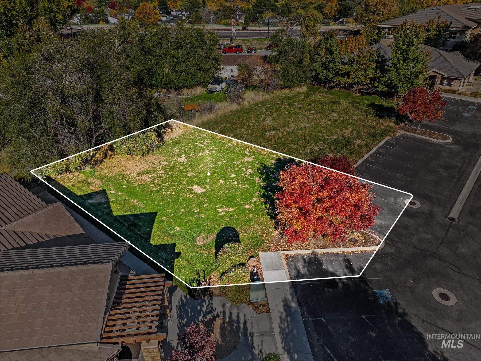 Aerial overview of property's location with property parcel outlined