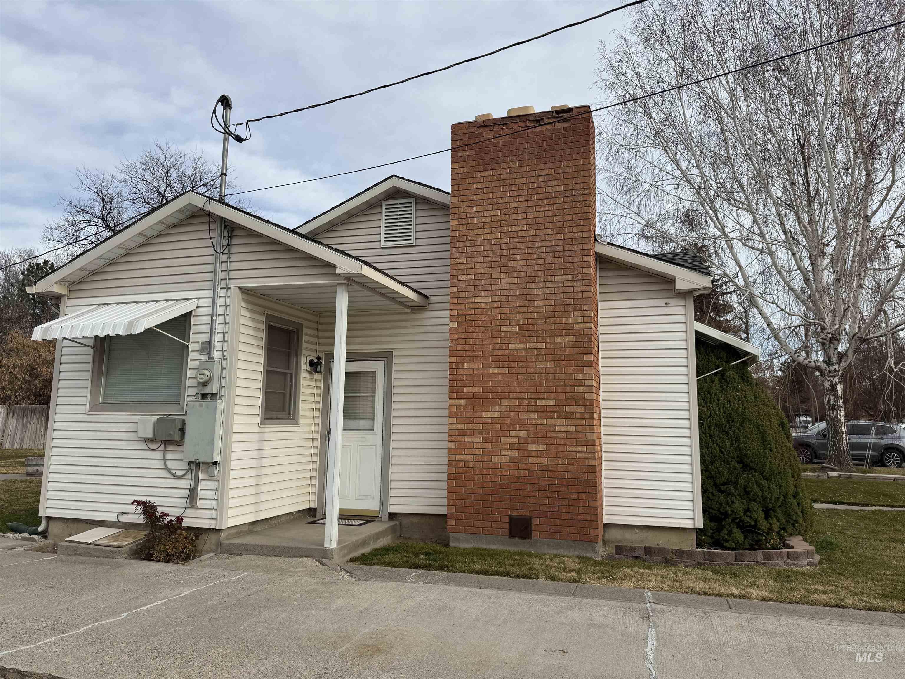 View of front facade with a chimney