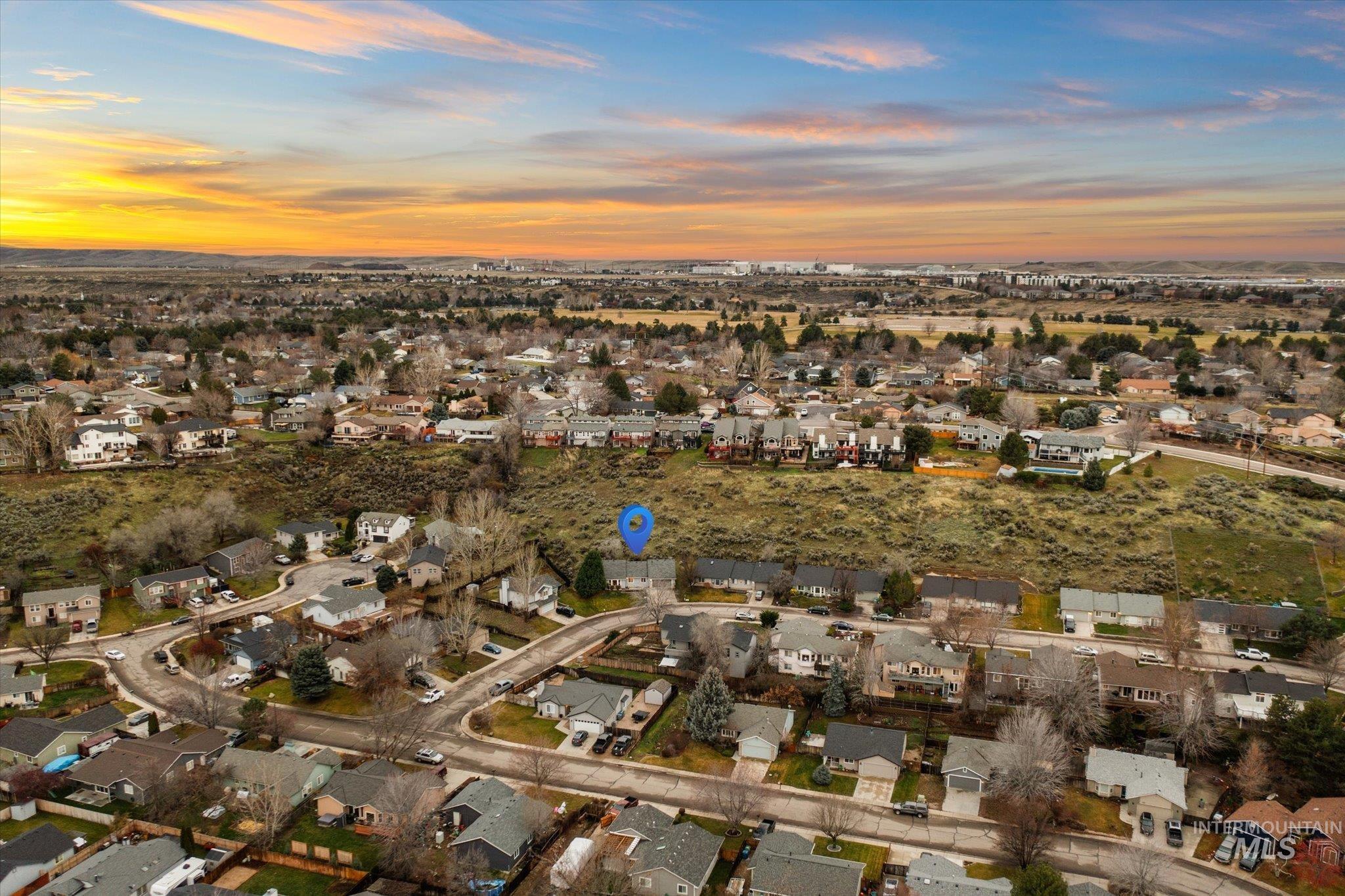 View of property location featuring nearby suburban area