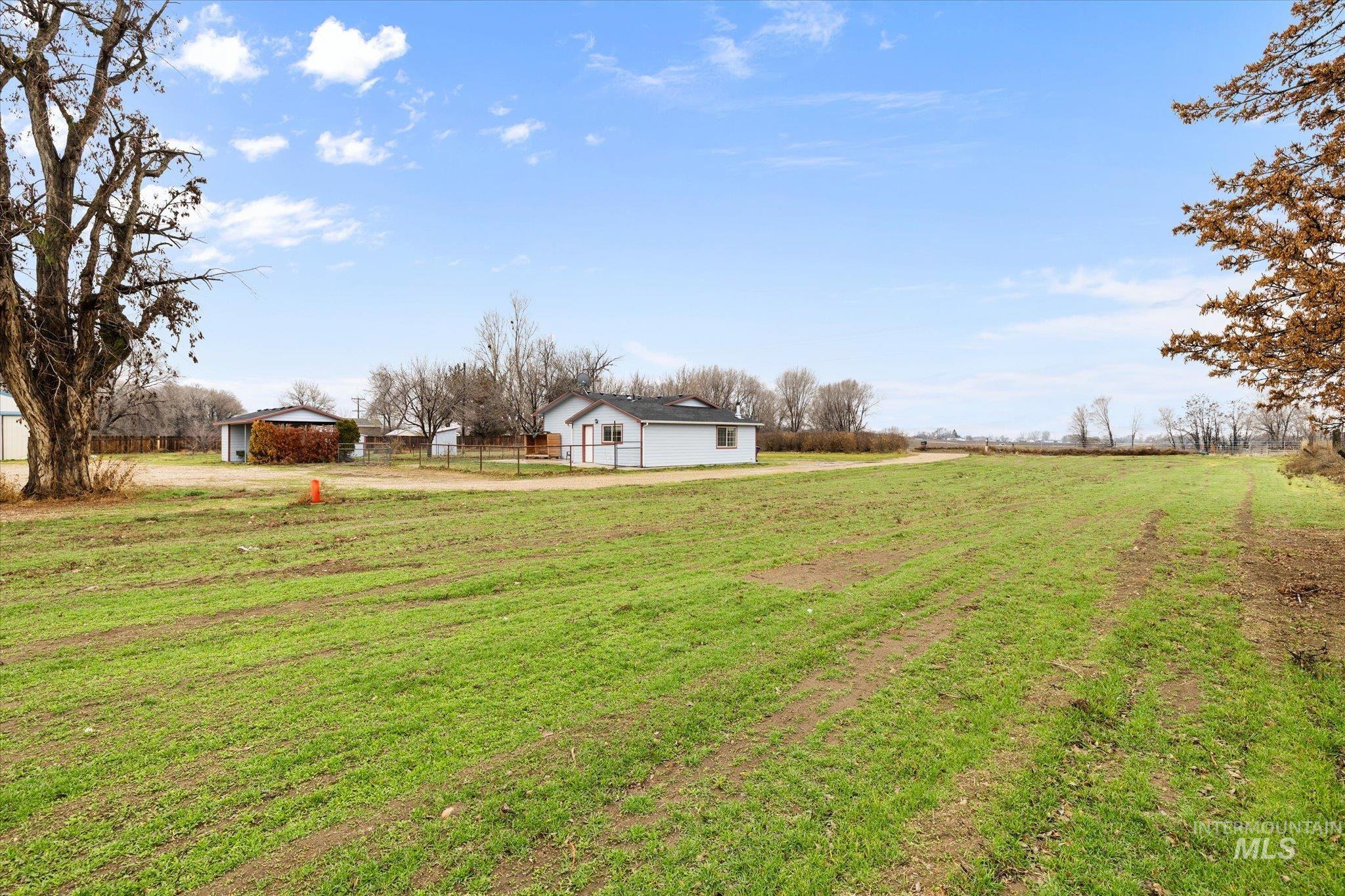 View of yard with a view of countryside