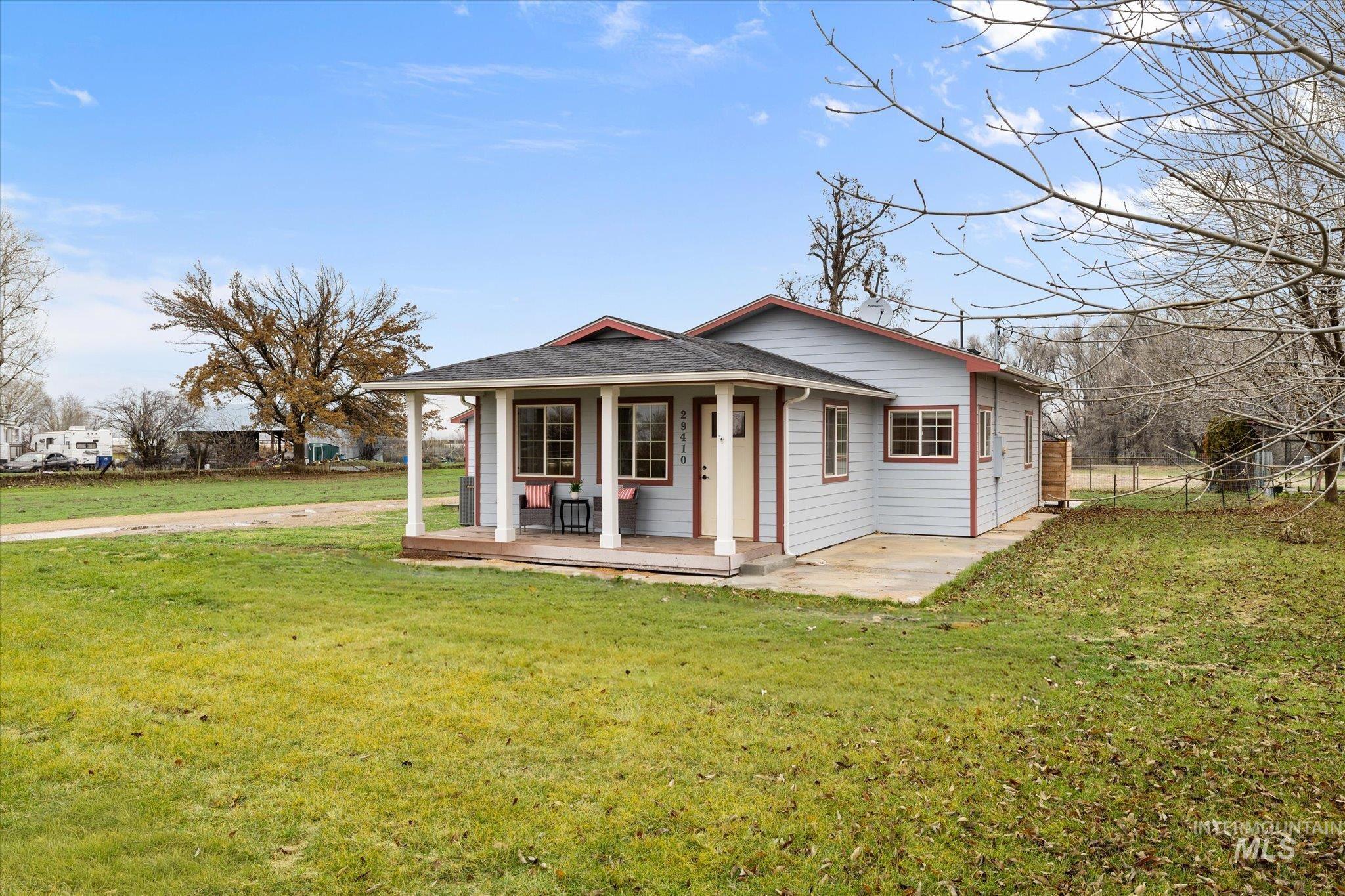 Bungalow-style house with a porch