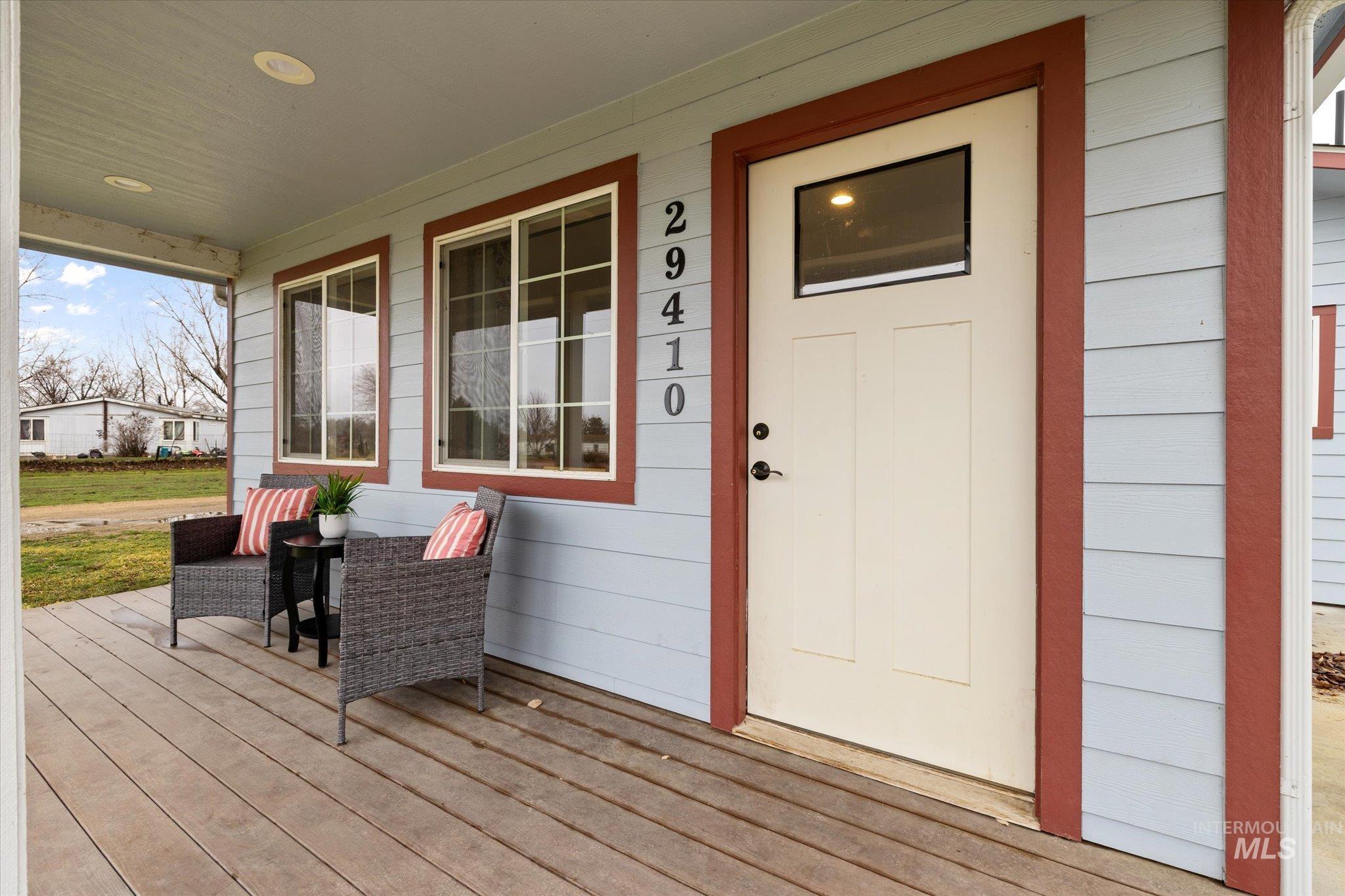 Property entrance with a porch