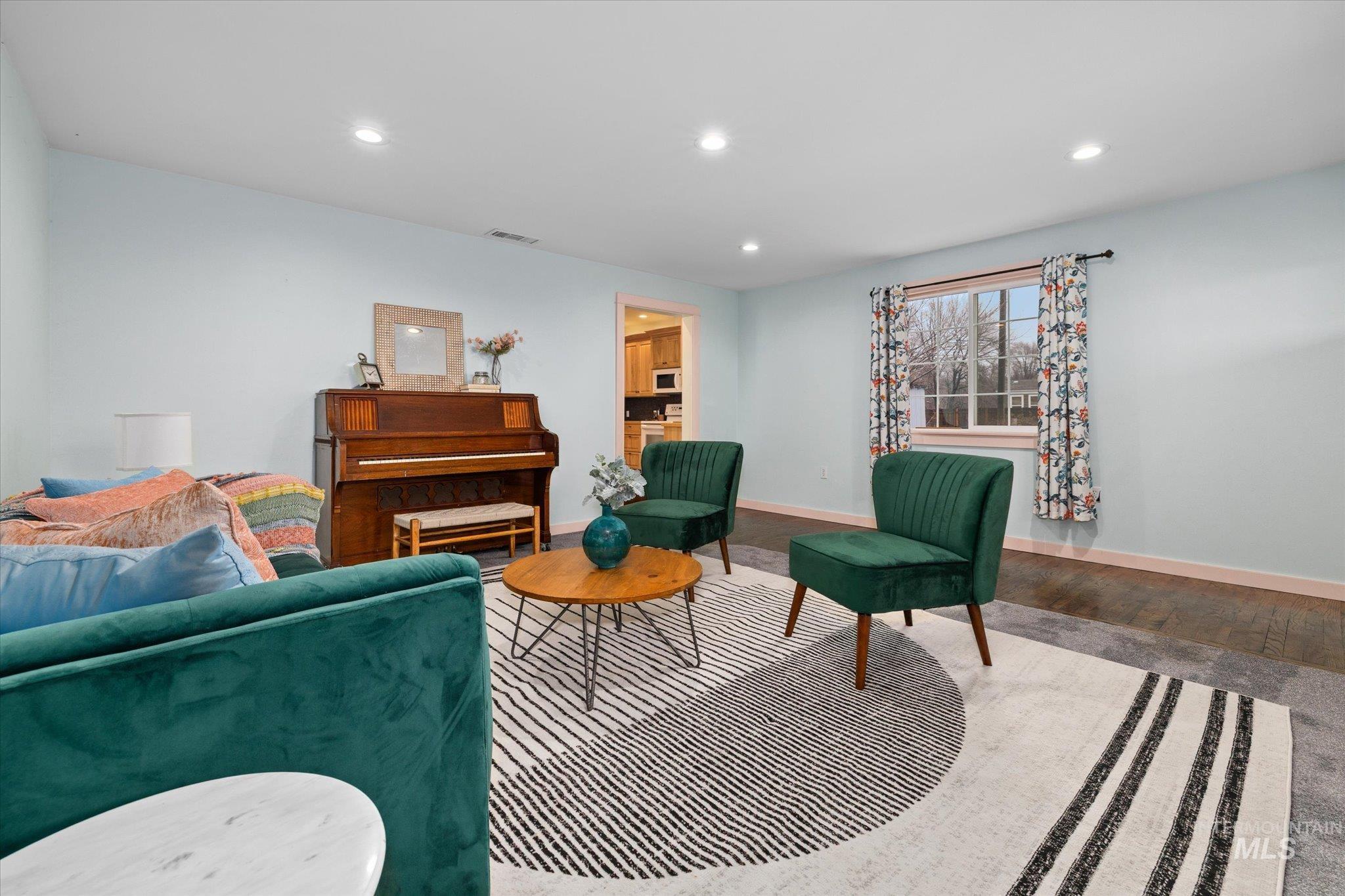 Living room featuring recessed lighting and wood finished floors