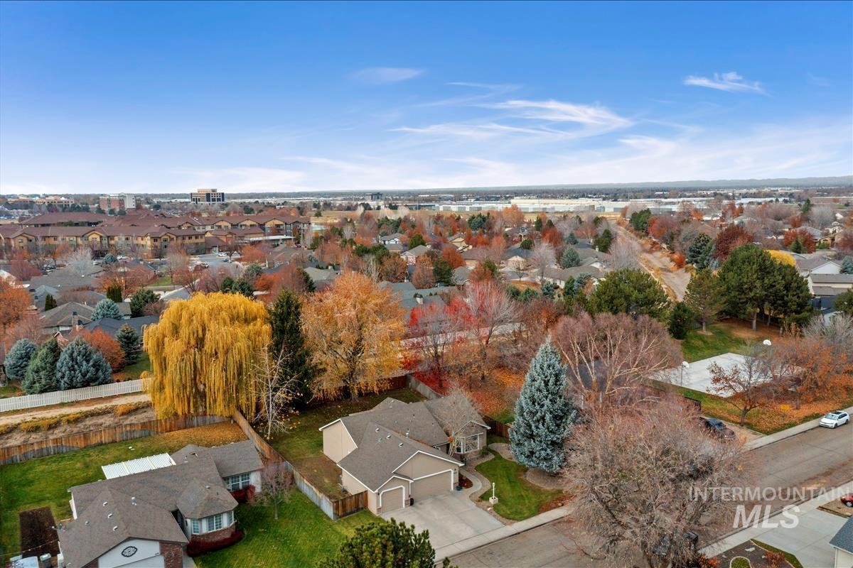 View of property location with nearby suburban area