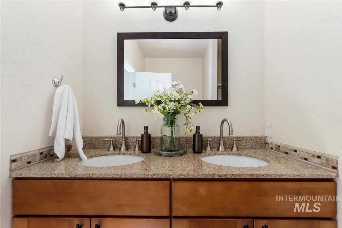 Full bathroom with double vanity