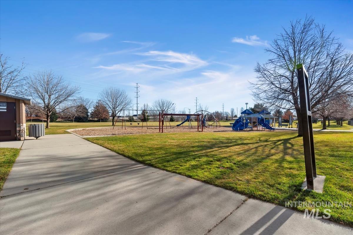 View of home's community featuring a lawn
