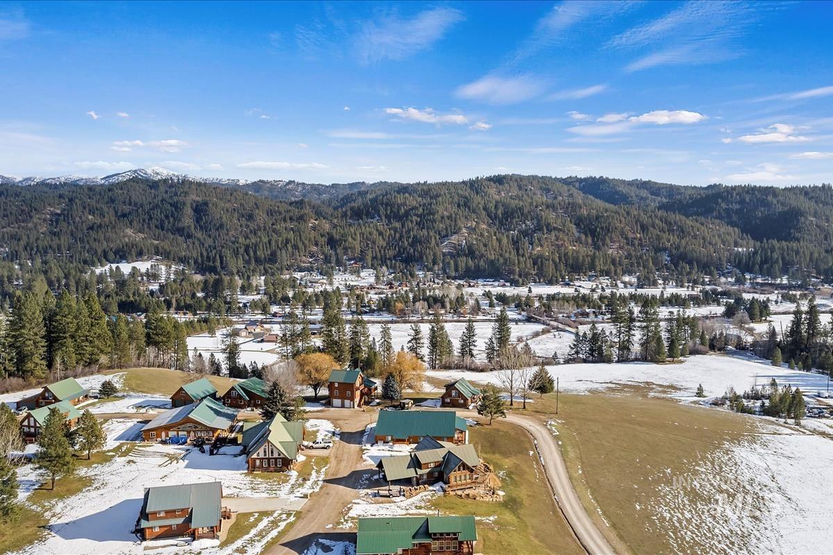 Snowy aerial view with a mountain view