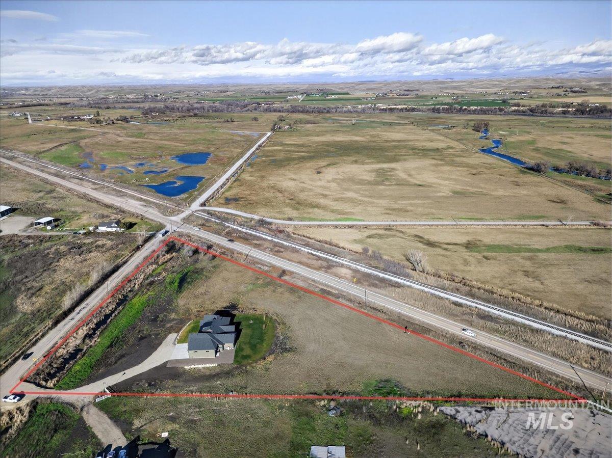 Overview of rural landscape featuring property boundaries highlighted