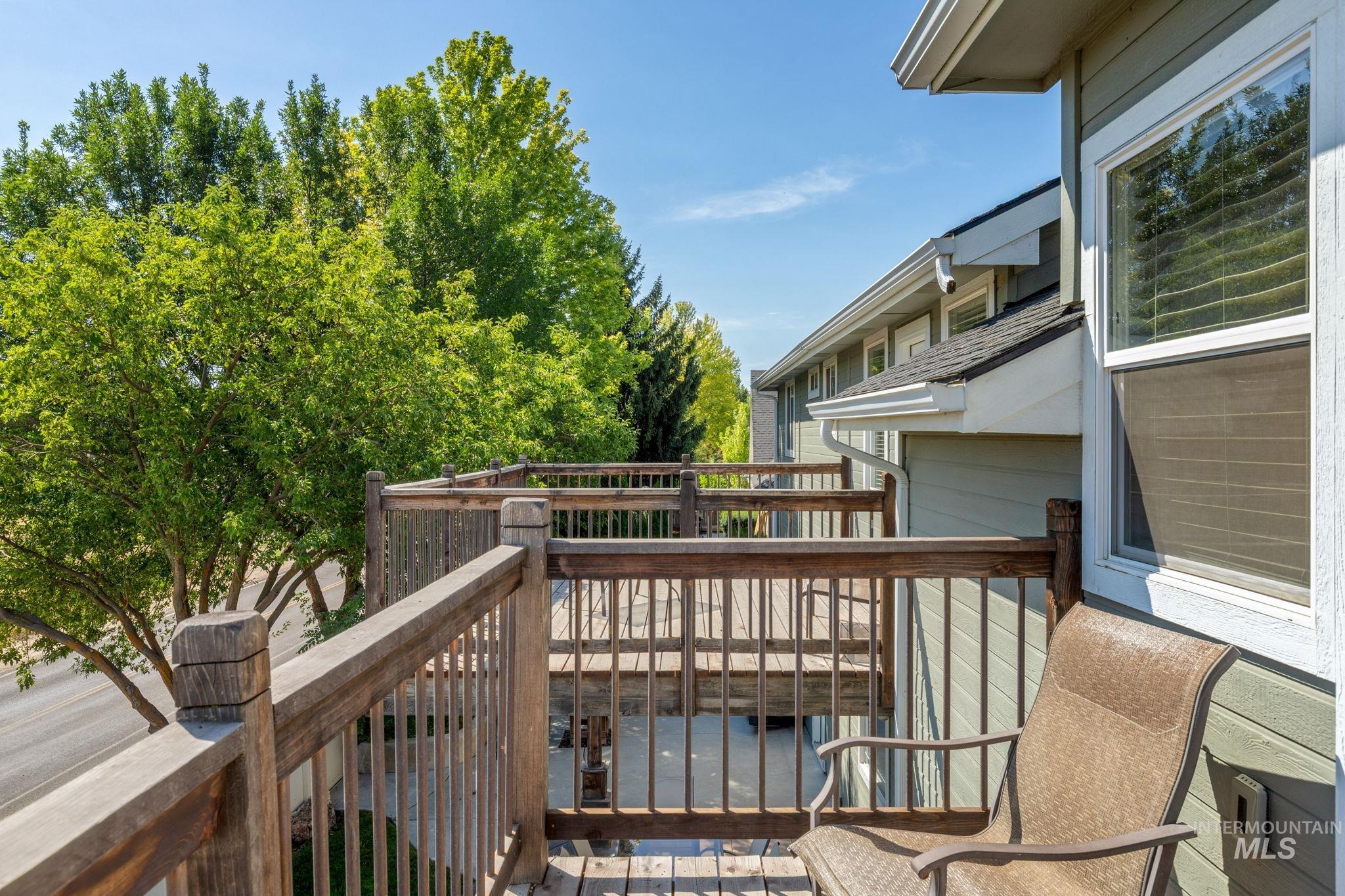 View of wooden balcony featuring a wooden deck