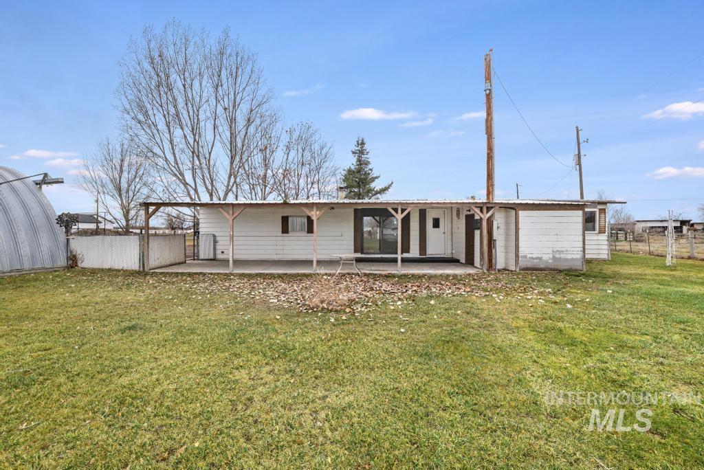 Back of property featuring a patio