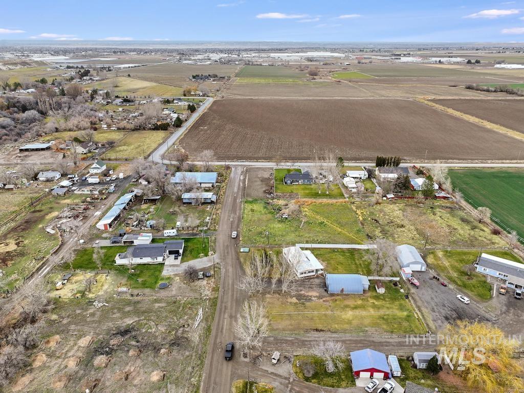 View of property location with rural landscape and farmland