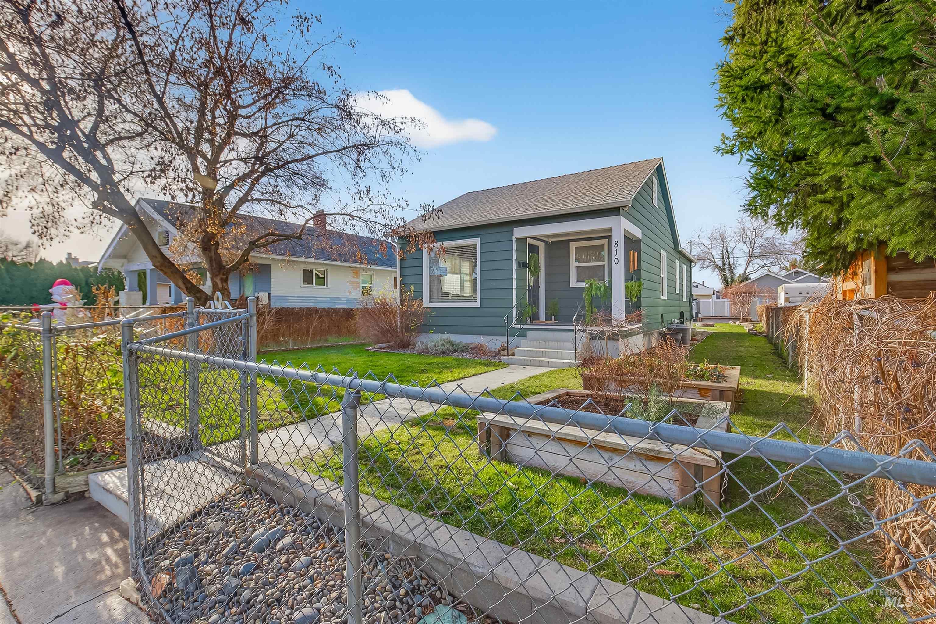 View of front facade featuring a shingled roof