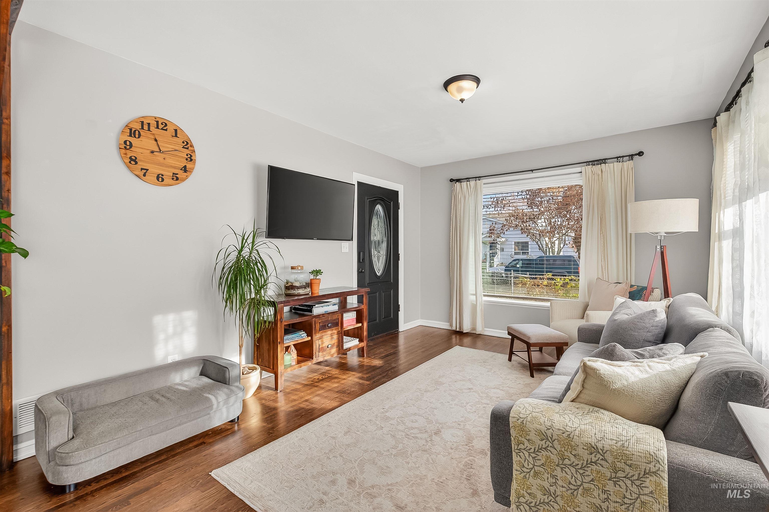 Living room featuring wood finished floors