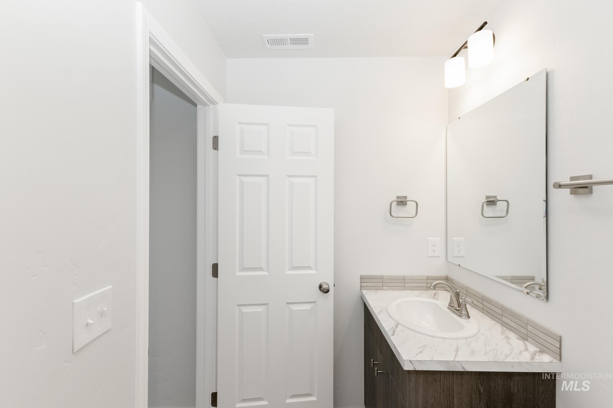 Bathroom featuring vanity