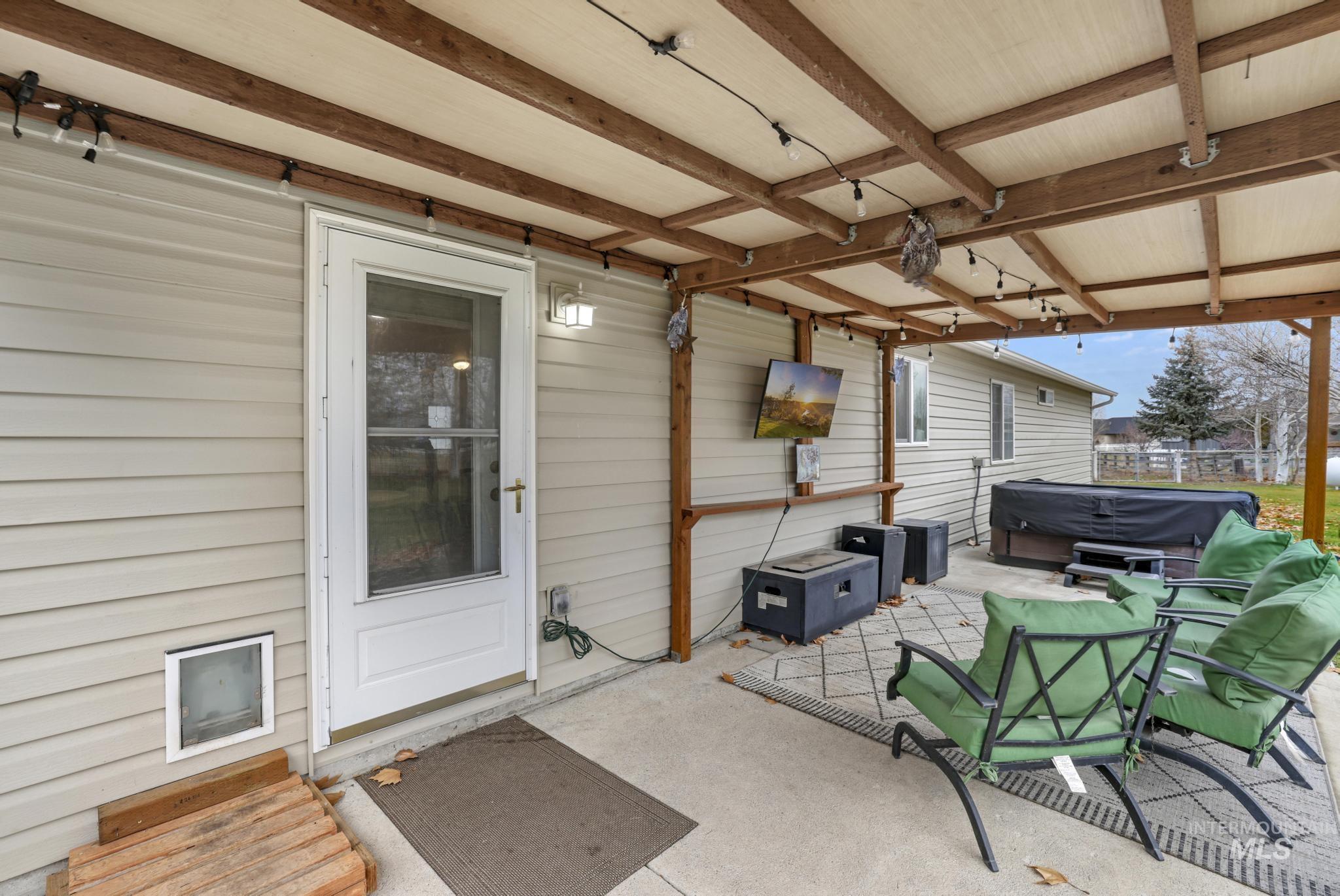 View of patio / terrace featuring a hot tub