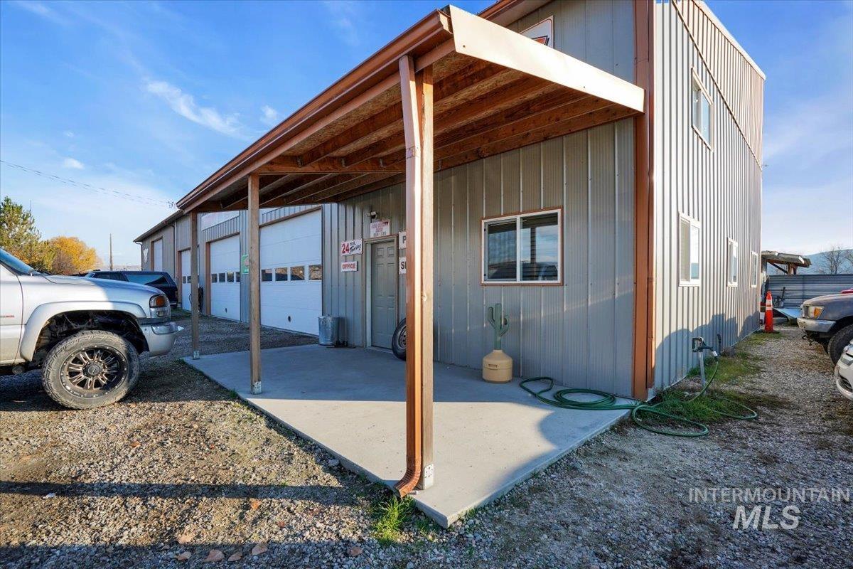 View of outdoor structure with a garage