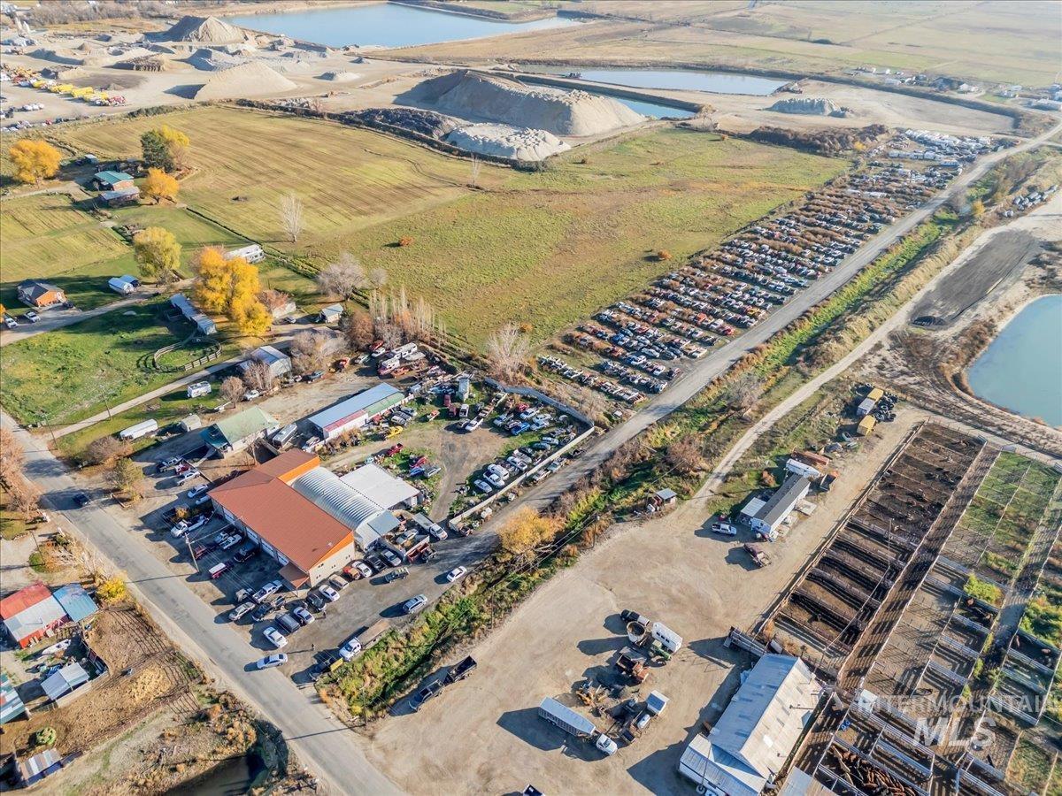 Aerial view of property's location with a nearby body of water