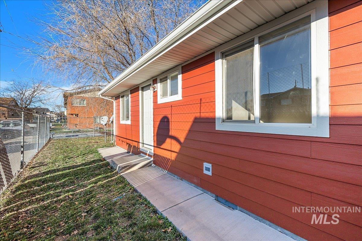 View of property exterior with crawl space