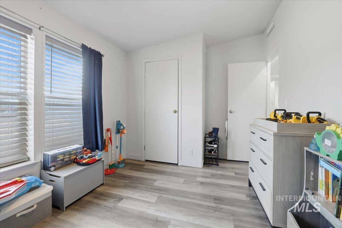Playroom with light wood finished floors