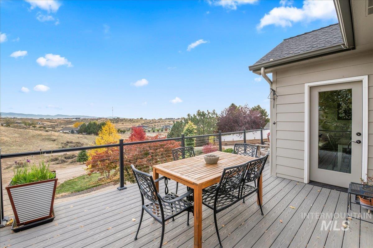 Wooden terrace with outdoor dining space