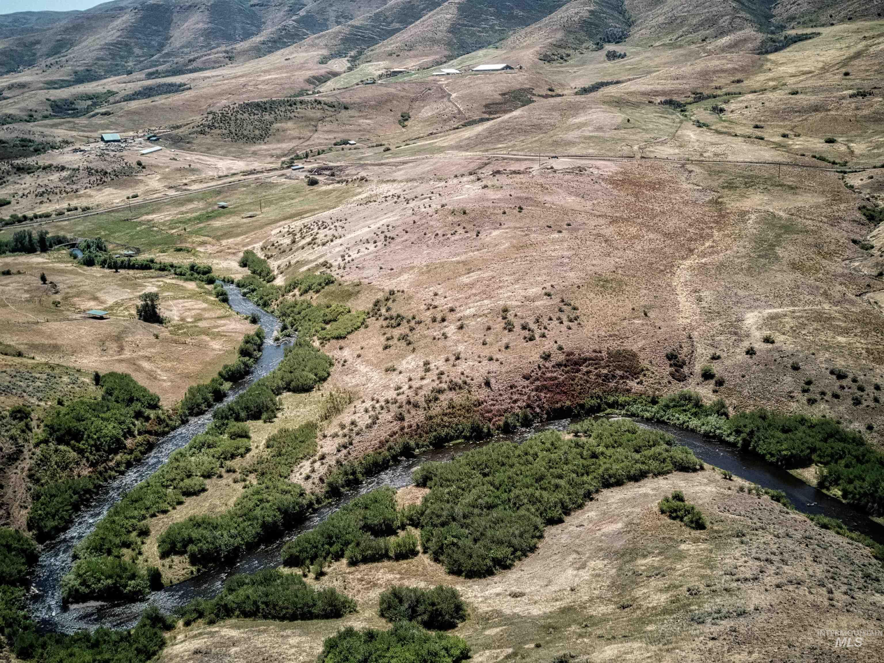 View of property location with rural landscape and a mountain backdrop